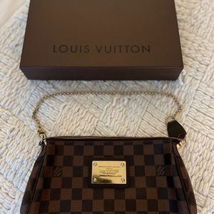LV Eva clutch purse. In excellent condition.
